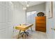 Home office with wood desk and built-in shelving at 7227 E Texas Ebony Dr, Gold Canyon, AZ 85118