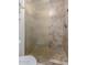 Updated shower with tile surround and glass enclosure at 7911 E Desert Trl, Mesa, AZ 85208