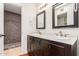 Bathroom with double vanity and a walk-in shower at 921 E Becker Ln, Phoenix, AZ 85020