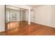 Bedroom with mirrored closet and hardwood floors at 921 E Becker Ln, Phoenix, AZ 85020