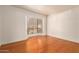 Bright bedroom with hardwood floors and bay window at 921 E Becker Ln, Phoenix, AZ 85020