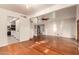 Open dining area with hardwood floors and kitchen views at 921 E Becker Ln, Phoenix, AZ 85020