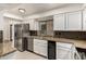 Modern kitchen with granite countertops and stainless steel appliances at 921 E Becker Ln, Phoenix, AZ 85020