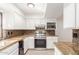 Modern kitchen with granite countertops and stainless steel appliances at 921 E Becker Ln, Phoenix, AZ 85020