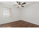 Bedroom with ceiling fan and hardwood floors at 955 N Jay St, Chandler, AZ 85225