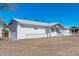 Side view of a white brick ranch house at 955 N Jay St, Chandler, AZ 85225