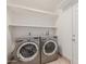 Laundry room with LG washer and dryer and shelving at 955 N Jay St, Chandler, AZ 85225