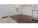 Living room with wood floors and ceiling fan at 955 N Jay St, Chandler, AZ 85225