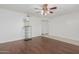 Spacious living room with wood floors and fan at 955 N Jay St, Chandler, AZ 85225