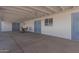 Covered patio with concrete flooring and seating area at 955 N Jay St, Chandler, AZ 85225