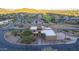 Aerial view of house with mountain background at 9823 E Dead Sure Pl, Gold Canyon, AZ 85118