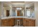 Elegant bathroom with double vanity and large mirror at 9823 E Dead Sure Pl, Gold Canyon, AZ 85118