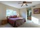 Bedroom with ensuite bath and mountain views at 9823 E Dead Sure Pl, Gold Canyon, AZ 85118