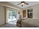 Bedroom with sliding door to private patio and en suite bathroom at 9823 E Dead Sure Pl, Gold Canyon, AZ 85118