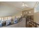 Upper level hallway with views to the living room at 9823 E Dead Sure Pl, Gold Canyon, AZ 85118