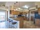 Spacious kitchen with granite countertops and stainless steel appliances at 9823 E Dead Sure Pl, Gold Canyon, AZ 85118