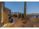 Landscaped backyard with desert plants, mountain views, and a tranquil setting at 9823 E Dead Sure Pl, Gold Canyon, AZ 85118