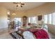 Comfortable living room with large windows and southwestern decor at 9823 E Dead Sure Pl, Gold Canyon, AZ 85118