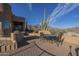 Large patio with mountain views and dining set at 9823 E Dead Sure Pl, Gold Canyon, AZ 85118