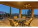 Covered patio with seating area and mountain views at 9823 E Dead Sure Pl, Gold Canyon, AZ 85118