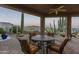 Evening view of patio with mountain backdrop at 9823 E Dead Sure Pl, Gold Canyon, AZ 85118