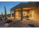 Spacious patio with seating area and access to the house at 9823 E Dead Sure Pl, Gold Canyon, AZ 85118