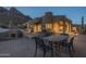 Relaxing patio with outdoor dining set and built-in grill at 9823 E Dead Sure Pl, Gold Canyon, AZ 85118