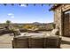 Spacious patio with firepit and seating, boasting scenic views at 9909 E Lookout Mountain Dr, Scottsdale, AZ 85262