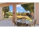 Spacious backyard with a patio and lush greenery at 11691 E Turquoise Ave, Scottsdale, AZ 85259