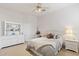 Bright bedroom with white furniture and a comfy bed at 11691 E Turquoise Ave, Scottsdale, AZ 85259