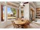 Bright breakfast nook with large window overlooking the backyard at 11691 E Turquoise Ave, Scottsdale, AZ 85259