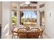 Breakfast nook with view of the backyard and a large window at 11691 E Turquoise Ave, Scottsdale, AZ 85259