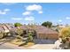 Single story home with tile roof and two car garage at 11691 E Turquoise Ave, Scottsdale, AZ 85259