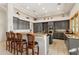 Modern kitchen featuring granite countertops and ample cabinetry at 11691 E Turquoise Ave, Scottsdale, AZ 85259