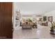 Bright and airy living area with tile floors and access to backyard at 11691 E Turquoise Ave, Scottsdale, AZ 85259