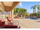 Inviting pool area with seating and landscaping at 11691 E Turquoise Ave, Scottsdale, AZ 85259