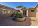 Hexagon tile courtyard with central planter and entryway at 14065 N 111Th Pl, Scottsdale, AZ 85255