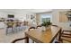 Open concept dining area with wood table and chairs, adjacent to kitchen at 1422 W Kennedy Ave, Coolidge, AZ 85128