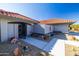 Front entry with walkway and decorative gate at 14607 W Sky Hawk Dr, Sun City West, AZ 85375