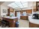 Bright kitchen with island and modern appliances at 14607 W Sky Hawk Dr, Sun City West, AZ 85375
