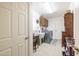 Functional laundry room with washer, dryer, and storage at 14607 W Sky Hawk Dr, Sun City West, AZ 85375