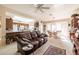 Open living space with kitchen, dining, and seating areas at 14607 W Sky Hawk Dr, Sun City West, AZ 85375