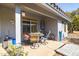 Covered patio with seating area, perfect for outdoor dining and relaxation at 14607 W Sky Hawk Dr, Sun City West, AZ 85375