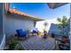 Relaxing brick patio with two rocking chairs at 14607 W Sky Hawk Dr, Sun City West, AZ 85375