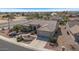 Single-story home with two-car garage and desert landscaping at 15511 W Agua Linda Ln, Surprise, AZ 85374