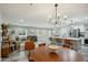 Open-concept living space featuring a modern kitchen with an eat-in island at 1632 E Maryland Ave, Phoenix, AZ 85016