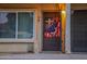 Condo entrance with tiled roof and double doors at 17241 N 16Th Dr # 10, Phoenix, AZ 85023