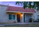 Condo exterior at dusk with lighted entryway at 17241 N 16Th Dr # 10, Phoenix, AZ 85023