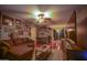 Open living room with sectional sofa and access to a patio at 17241 N 16Th Dr # 10, Phoenix, AZ 85023