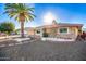 Single-story home with landscaped front yard at 17642 N Whispering Oaks Dr, Sun City West, AZ 85375